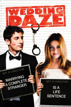 a man and woman holding up signs in front of a poster for the movie wedding baze