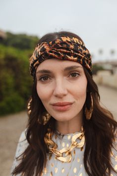 This turbanesque twist headband was handmade in San Diego using an ultra luxe rayon stretch velvet. Pair it with jeans and a striped tee for a casual look, or top off your floor-length bohemian gown for the ultimate luxe look! Machine wash cold, gentle cycle, and lay flat to dry. Bohemian Gown, Twist Headband, Stretch Velvet, Style Expert, Hair Accessories Headbands, Independent Designers Fashion, Striped Tee, Floor Length, Casual Looks