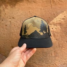 Carry your own five star view with you wherever you go. Our five star view outdoor tenting scene is screen printed onto the front of this latte brown hat w/ black mesh and adjustable snapback. Trucker Baseball Cap For Travel, Snapback Trucker Hat For Travel, Trucker Snapback Hat For Travel, Black Trucker Hat For Travel, Brown Snapback Hat For Outdoor Activities, Flat Brim Trucker Hat For Outdoor Activities, Trucker Style Snapback Hat For Adventure, Brown Trucker Hat For Outdoor Activities, Trucker Hat With Flat Brim For Outdoor Activities