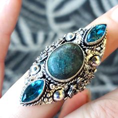 Brand New Handmade Oversized Chrysocolla And Blue Topaz Silver Statement Ring. Size 7 925 Stamped Chrysocolla Is A Stone Of Empowerment Of The Feminine Energies, Teaching That Genuine Power Is Best Expressed Through Gentleness. It Is A Stone Of The Goddess, And Those Who Resonate With It Will Likely Feel Her Ancient And Enduring Energies Rising Within Themselves. It Calms, Cleanses And Re-Energises All The Chakras. It Draws Out Guilt, Heals Heartache And Increases The Capacity To Love New To Pos Blue Bohemian Jewelry With Accent Stones, Bohemian Blue Crystal Sterling Silver Ring, Bohemian Blue Crystal Ring In Sterling Silver, Blue Natural Stone Crystal Ring In Sterling Silver, Blue Turquoise Ring With Gemstone Accents In Sterling Silver, Blue Sterling Silver Crystal Ring With Natural Stones, Sterling Silver Turquoise Ring With Gemstone Accents, Blue Turquoise Sterling Silver Ring With Stones, Blue Turquoise Ring With Sterling Silver