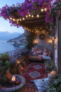 an outdoor patio with lots of flowers and lights