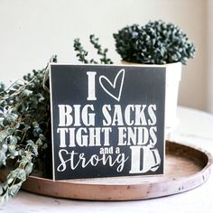 a sign that says i love big sacks tight ends and a strong d