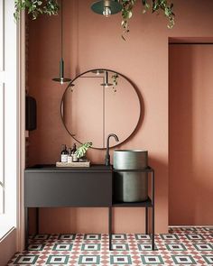 a bathroom with a sink, mirror and potted plant