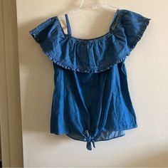 Bcx Women's Denim Off-The-Shoulder Blouse With Tie-Up New Without Tags | Size M | Color Denim\Blue Measurements: Length From Shoulder To Hem 18" | Pit To Pit: 20" Summer Cotton Top In Denim Blue, Summer Denim Blue Cotton Top, Denim Blue Summer Top For Day Out, Summer Denim Blue Tops For Day Out, Summer Chambray Blouse In Denim Blue, Denim Blue Denim Blouse For Summer, Summer Denim Blue Chambray Blouse, Denim Blue Summer Blouse For Day Out, Denim Blue Chambray Blouse For Summer