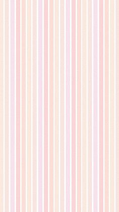 a pink and white striped wallpaper with vertical stripes