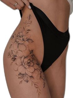 a woman's stomach with flowers on it