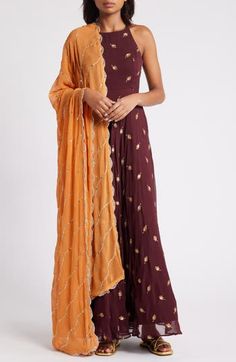 A silk-crepe dupatta pairs perfectly with this sweeping anarkali adorned by embroidered details and designed with handy pockets. 54" length (size Medium) Includes dress and dupatta Bateau neck Back keyhole with hook-and-eye closure On-seam pockets Lined 100% viscose Spot clean Made in India Asian Owned/Founded Silk Palazzo Set With Dupatta In Maxi Length, Silk Palazzo Set For Diwali, Maxi Length, Silk Maxi Palazzo Set For Diwali, Silk Maxi Length Palazzo Set For Diwali, Silk Anarkali Palazzo Set Maxi Length, Georgette Dupatta With Cutdana In Maxi Length, Silk Dupatta With Dabka Work, Maxi Length, Contrast Dupatta, Anarkali With Dupatta