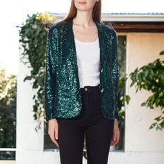 Introducing the Anna-Kaci Women's Long Sleeve Sparkle Sequin Two Button Blazer Jacket :a radiant and stylish choice that effortlessly combines glamour with sophistication. This dazzling blazer is adorned with sequins, providing a sparkling touch that sets it apart from the ordinary. The classic two-button design adds a timeless element to the jacket, making it a versatile piece for both special occasions and elevating your everyday ensemble. Step into the spotlight, exude confidence, and let you Double Button Long Sleeve Blazer For Night Out, Trendy Single Breasted Party Blazer, Long Sleeve Double Button Closure Blazer For Night Out, Party Blazer With Double Button Closure, Fall Outerwear For Night Out With Buttons, Trendy Green Outerwear For Party, Party Blazer With Double Button Closure And Long Sleeves, Night Out Button-up Outerwear With Button Closure, Casual Buttoned Outerwear For Parties