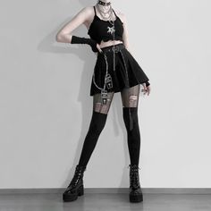 Material: Polyester 
Color: Black 
Size: Size: US-XS(Label Asian-S)-US-M(Label Asian-L) 
Sku:?S14985 Punk Style Black Skirt For Concert, Black Punk Skirt For Concert, Black Skirt For Halloween Concert, Black Mini Skirt In Punk Style, Black Punk Skirt For Club, Black Punk Skirt For Club Wear, Black Rock Style Mini Skirt For Streetwear, Black Rock Mini Skirt For Streetwear, Gothic Black Club Skirt