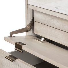 a close up view of a drawer with an open door on the bottom and side