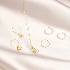 We’re picky about our pearls. Our collection of modern-feel pearl pieces takes your grandmother's favorites and incorporates them into the latest trends, interpreted from our NYC-gal perspective. These gem-quality pearls are freshwater cultured beauties, set in solid 10k gold that won't tarnish or flake. We may have expensive taste, but crazy mark-ups aren’t really our thing. So we balance the best quality and the best price — enough said. 10k Solid yellow gold White freshwater cultured pearl 20 Girl Tools, Sparkly Top, Jewelry Brands, Pave Diamond Ring, Wedding Sale, Expensive Jewelry, Sell Gold, White Freshwater Pearl, Top Drawer