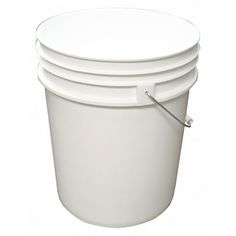 three white plastic buckets stacked on top of each other