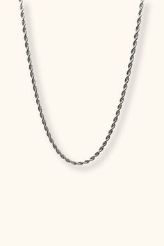 Our Silver Laura Twist Rope Chain Necklace is a timeless and elegant necklace that adds a touch of luxury to any outfit. Elevate your jewelry collection with this must-have piece that's perfect for dressing up or down! All of our jewelry comes with a free jewelry pouch and cloth to keep your pretties safe and clean. Details Color: SilverMaterial: Stainless SteelSize: 15inWidth: 3mm Care Guide Store in a dry, cool place away from sunlight i.e. Blush & Bliss pouch Gently wipe with a soft cloth aft Classic Rope Chain Necklace, Sterling Silver Link Necklace With Rope Chain, Classic Silver Rope Chain Necklace Gift, Classic Silver Rope Chain Necklace As Gift, Classic Link Rope Chain Necklace For Formal Occasions, Minimalist Rope Chain Link Jewelry, Metal Link Rope Chain Jewelry, Formal Clavicle Snake Chain Necklace, Classic Link Chain Necklace With Rope Detail