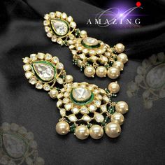 Moissanite and Swarovski Pearls with Green Enamel Earring | Indian Wedding Jewelry | Indian Moissanite Polki Earring| Statement Earring Material : Silver Gemstone: Moissanite, Swarovski, Green Enamel Stone colour: Uncut Polki Primary colour: Gold Size-Length: 85mm Width: 40mm Closure : Screw back and Clips Silver Intricate, hand crafted, Pure Silver Polki Earrings, studded with high quality Moissanite and Swarovski Pearls with Green Enamel Earring comes with screw back and clips, made in 92.5 si Luxury Green Diamond Earrings For Wedding, Luxury Rose Cut Diamond Chandelier Earrings For Wedding, Gemstone Drop Earrings For Wedding, Luxury Green Chandelier Earrings For Wedding, Wedding Gemstone Drop Danglers, Gemstone Danglers For Wedding, Elegant White Kundan Earrings, Elegant Pearl Earrings With Stone Work As Gift, Elegant Pearl Earrings With Stone Work For Gift