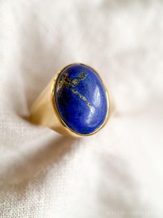 *Cabochon Gemstone Ring *18k Yellow Gold *Lapis Lazuli *Genuine *20 x 15 mm *Circa 1970s *Ring Size US 11.5 *Very Good Condition *15.4 grams ☞ Personalized Ring Sizing is complementary with the purchase of this ring! Simply select the size you would like from the drop down menu, and we will take care of it for you! ☞ Some fine jewelry items may show patina or signs of age or wear in photos. Rest assured, your jewelry will be carefully cleaned and polished prior to shipping! If you would like the Lapis Lazuli Gemstone, Personalized Ring, Cabochon Ring, Personalized Rings, Auburn, Rings Statement, Gemstone Ring, The 1970s, Lapis Lazuli