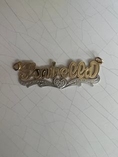 Made in either 10k or 14k real solid gold, our nameplates is personalized and made to order. Necklace is 100% authentic 10k or 14k solid gold heavyweight necklace (not filled-plated or hollow) *Cuban link chain weight approximately: 6-10g *Name charm size approximately: 1.5"x1/5"inches (7 letters max) -how to order: Select: NAME CHARM ONLY OR WITH 3MM NECKLACE SIZE. *3mm necklace size available: 14in,16in,18in,20in,22in,24inches. -shipping:1-4 days -labor: 1-5 days -looking for a different desig Customizable Nameplate Necklace In White Gold, Customizable White Gold Nameplate Necklace, Engraved White Gold Custom Nameplate Necklace, Engraved Custom Nameplate Necklace For Anniversary, Engraved 14k White Gold Name Necklace, Engraved White Gold Nameplate Necklace, 14k White Gold Nameplate Necklace, Custom 14k Gold Nameplate Necklace, Customizable 14k Gold Pendant Name Necklace