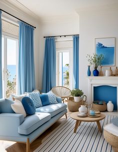 a living room filled with furniture and blue curtains