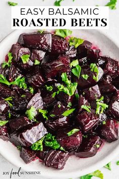 a white bowl filled with beets and parsley