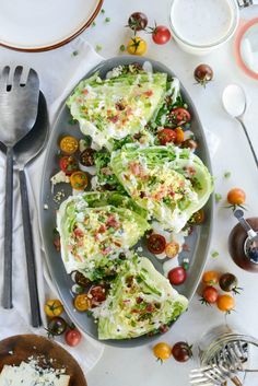 lettuce wraps with tomatoes and cheese on a plate