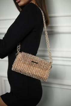 Crystal beaded bags are popular choices for formal occasions, evening events, or any time when a touch of glamour is desired. They can add a statement-making element to an outfit and are often chosen to complement elegant dresses or evening gowns. The beaded texture of the bag not only adds visual interest but also provides a tactile and luxurious feel. Whether you're treating yourself or searching for the perfect gift for a fashion-forward friend, this crystal beaded bag is sure to impress. Ele Luxury Beaded Beige Shoulder Bag, Long Sleeve Mermaid Prom Dress, Sparkle Purse, Charm Bracelets For Girls, Gold Handbag, Crystal Handbag, Purse Outfit, Hand Beaded Bag, Beaded Clutch Bag