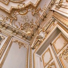 an ornately decorated ceiling with gold trim