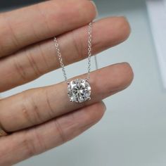 Product: Floating Solitaire Pendant Necklace with 4 Carat Moissanite Diamond  Metal:  14K Solid White Gold Stamped 14K Chain: 16+2inches Role Chain Stone Weight:  10.0mm- 4.0 carat Total Weight: About 3.76G Certificate:  Every Moissanite has individual number on it and come with same number certificate. Exclude 3mm Moissanite  Package: Elegant gift box is included. Jewelry makes a great gift for Mother's Day, Anniversary, Wedding, Birthday, Holiday, Christmas, Valentine's Day, Graduation Gift for Sister, Mother, Mom, Grandmother, Daughter, Wife, Girlfriend, Grandma, Female, Best Friend or it will be a good treat for yourself Graduation Gifts For Sister, Round Diamond Pendant, Floating Diamond Necklace, Floating Necklace, Solitaire Pendant Necklace, Solitaire Necklaces, Vs Diamond, Gift For Sister, Solitaire Pendant