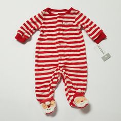 Holiday Sleeper By Carter's. Crafted In Soft Cotton With A Cute Dog, This 1-Piece Gets Them Ready For Bed In This One Piece! Snaps From Ankle To Chin Ribbed Cuffs & Neckline Allover Stripes Print Appliqu And Embroidered Santa Foot Art Imported Machine Washable 75% Cotton 25% Polyester Red Long Sleeve Onesie For Playwear, Red Long Sleeve Onesie For Play, Playful Red Onesie For Bedtime, Red Cotton Holiday Onesie, Playful Red Bedtime Onesie, Red Onesie For Playtime In Winter, Red Winter Onesie For Playtime, Cute Red Onesie For Loungewear, Red Playful Winter Onesie