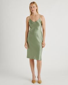 We love the midi length and bias cut of this dress! This super flattering fit is made from 100% mulberry silk, in a satin finish. The kicker? Our silk is washable. Easy to style, easy to wash for low-maintenance luxe. Plus, silk fiber contains 18 kinds of amino acids that make it amazing for skin nourishment, hypo-allergenic, and naturally thermoregulating to help maintain body temperature. Fitted Knee-length Bias Cut Satin Dress, Fitted Knee-length Satin Dress With Bias Cut, Spring Silk Knee-length Slip Dress, Sleek Silk Midi Slip Dress, Sleek Midi-length Bias Cut Slip Dress, Sleek Bias Cut Midi Slip Dress, Silk Midi-length Slip Dress With Bias Cut, Satin Bias Cut Knee-length Dress, Satin Knee-length Bias Cut Dress