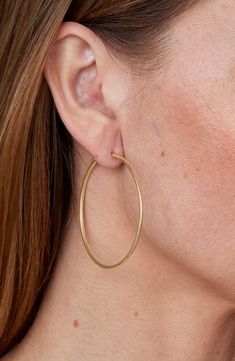 Thin tube offers minimalist appeal against polished hoop earrings that are perfect for everyday wear. 0.8" width Hinge with snap-post closure 18k-gold plate or gold fill Made in Brazil Medium Hoop Earrings Gold, Unique Gold Hoop Earrings, Big Hoops Earrings, Small Hoops Earrings, Hoop Earrings Aesthetic, Dream Accessories, Dainty Gold Earrings, Thick Hoop Earrings, Dainty Hoop Earrings