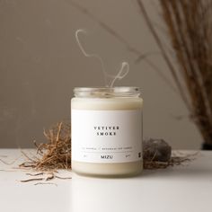 "VETIVER SMOKE  : 100% Natural Soy + Essential Oil Candle  Vetiver  /  Patchouli  /  Clove The scent of fresh earth, cradling a glowing ember... A fragrant smoke drifting through fields of tall, golden grass. Smokey, sweet notes of Vetiver find harmony  with the grace of a powdery, aged Patchouli...  as a single smoldering Clove adds a layer of  warmth and comfort to this grounding aroma.     Use for: Centering / Grounding ( see below )        +    100% Natural +    Scented exclusively with esse Modern Candle, Minimalist Candle, Minimalist Product Photography, Candle Photography Inspiration, Earthy Candles, Minimalist Candles, Earthy Fragrance