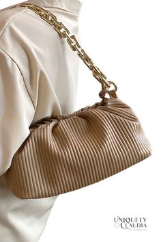 Gorgeous and unique to take your style up a notch...check out our Shaune Pleated Handbag – it's chic, sophisticated, and totally on trend. This ultra-soft vegan leather bag comes with two straps, and it is a 3-in-1...it can me worn as a clutch, under-shoulder, or crossbody. A goldtone bold chainlink, and a crossbody strap that lets you go hands-free. Plus, the pleated design is both eye-catching and elegant, and the handbag itself is spacious enough to hold all your essentials. Whether you're he Bag Styling, Tan Handbags, Vegan Leather Handbag, Vegan Leather Bag, Black Leather Handbags, Clutch Handbag, Leather Handbag, Rebecca Minkoff Hobo, Canvas Material