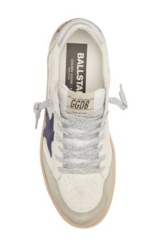 Glittery laces accentuate the signature scuffed-up details of a low-top sneaker complete with the label's iconic star patch. Lace-up style Textile and leather upper and lining/rubber sole Made in Italy Women's Designer Shoes Navy Golden Goose, Golden Goose Ball Star Outfit, White Everyday Sneakers, Off White Shoes Women, Sneakers For Women 2023, Golden Goose High Tops, Golden Goose Ball Star, Golden Goose Sneakers Outfit, Preppy Shoes