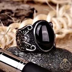 Men's onyx gemstone signet ring which will give you a head turning presence. This mystic, vintage style, engraved ring has a unique design for the polished, refined, and distinguished man. Perfect for casual and formal events, it will make your friends envious as you walk into the room full of confidence and pride. Looking for a unique, one of a kind GIFT FOR HIM, groomsman gift, father's day gift, teacher day gift? Look no further. This cool gemstone ring is the right answer and best gift for a Symbolic Black Stainless Steel Rings, Adjustable Black Symbolic Signet Ring, Black Spiritual Engraved Ring For Anniversary, Symbolic Black Oval Jewelry, Rings Black Stone, Mens Ruby Ring, Mens Turquoise Rings, Onyx Rings, Onyx Ring Men