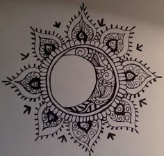 an intricately designed wall with arrows and circles on the bottom, in black ink