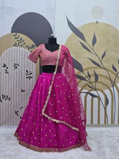 Fabric : 👉 Taffeta silk lehenga with sequence & zari work  ( 3 meter flair ) 👉 Taffeta silk blouse with sequence work all over front & back ( Unstitch ) 👉 Net Dupatta with sequence work & border work CARE INTRODUCTION:- HAND WASH \ ONLY DRY AND CLEAN What is meaning of semi stitched Product :- Semi stitch lehenga means that the pattern of the lehenga is ready and only the fitting of the lehenga as per your waist and height(waist to floor) has to be done. The blouse(Choli) of lehenga is UN-sti Semi-stitched Art Silk Lehenga With Self Design, Pink Dola Silk Lehenga With Cutdana Details, Pink Chanderi Lehenga With Cutdana, Satin Sets With Resham Embroidery For Festivals, Fitted Satin Dupatta With Resham Embroidery, Satin Resham Embroidery Sets For Festivals, Festive Satin Dupatta With Resham Embroidery, Festival Satin Sets With Resham Embroidery, Pink Art Silk Lehenga With Cutdana