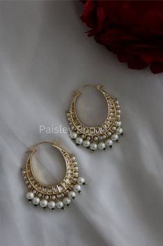 The chandbali hoops are handcrafted by the artisans of India to create a perfect romance between classic and modern concepts of Indian jewelry. The beautiful work of art made in 22K gold plating in a melange of high-grade kundan and pearls transcends the boundary of age and time that speak the language of opulence. Add this traditional Indian bridal beauty to your jewelry wardrobe and make it your companion for your special days. Earrings Length - 7 cm Closure - Lever Back Style Tip - A perfect Luxury Chandbali Lehenga For Traditional Ceremonies, Luxury Traditional Chandbalis For Wedding, Luxury Elegant Chandbali Bangle, Luxury Chandbali Necklaces For Festivals, Cheap Traditional Earrings For Summer, Luxury Traditional Chandbalis With Cutdana, Luxury Round Chandbalis For Reception, Luxury Elegant Chandbalis For Ceremonial Occasions, Affordable Bohemian Jewelry For Diwali