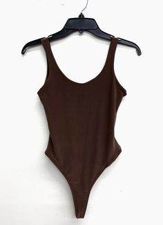 This tank style bodysuit is double lined so, it’s not see through. Great for layering under blazers and jackets. It pairs well with our Autumn Kimono Set. Or with a pair of jeans. A definite wardrobe essential. 92% Polyester, 8% Spandex Chic Fitted Bodysuit For Layering, Cotton Bodysuit For Everyday, Cotton Bodysuit For Everyday Wear, Solid Cotton Bodysuit For Everyday Wear, Casual Stretch Bodysuit For Everyday Wear, Fitted Cotton Bodysuit For Everyday Wear, Everyday Fitted Cotton Bodysuit, Everyday Solid Fitted Bodysuit, Trendy Stretch Bodysuit For Everyday