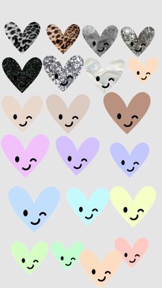 hearts with faces drawn on them in different colors and shapes, including one heart that has been