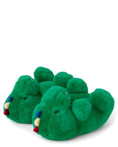 FABRICATION: 50% recycled polyester/50% polyester faux fur upper, imported CLOSURE: Slip-on style FEATURES: Embroidered dino face, 3D dino spikes and teeth Boys Dino Slippers - Gymmies | Gymboree | Boys | Dino Slippers - Gymmies in Green | Size Toddler 9-10 | Polyester Dino Slippers, Dinosaur Shoes, Dinosaur Slippers, Footwear Design, House Slippers, Big Kids, Great Ideas, Cool Kids