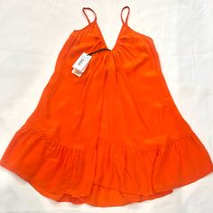 Nwt Shahida Parides Dress In Sunset 100% Silk Size: M / Beautiful Color And Material V-Neck Front, Scoop Back V-neck Ruffled Sundress For Daywear, Orange Lined V-neck Dress, V-neck Sundress Mini Dress For Daywear, Orange V-neck Lined Dress, Brunch V-neck Lined Sundress, Orange Ruffle Hem Beach Dress, Orange Beach Dress With Ruffle Hem, Orange Ruffle Hem Dress For Beach, Summer Orange V-neck Midi Dress