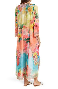 ↵  ↵  ↵  A blooming floral print long duster brings effortless boho vibes to your wardrobe. 39'' front length; 54'' back length (size O/S) Open front Kimono sleeves Floral print Woven 100% polyester Dry clean Imported Model stats: 5'10", 32" bust, 25" waist, 36" hip. Model is wearing size OS. Spring Digital Print Kaftan, Spring Long Kaftan, Spring Printed Maxi Length Kaftan, Bohemian Multicolor Print Kimono For Spring, Spring Multicolor Open Front Kaftan, Multicolor Open Front Kaftan For Spring, Summer Long Sleeve Kaftan With Printed Motifs, Spring Beach Kaftan With Printed Motifs, Summer Multicolor Digital Print Kimono