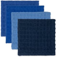 four blue and black towels on a white background