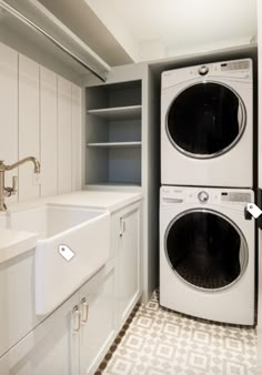 a washer and dryer in a small room