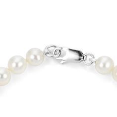 5-5.5mm Cultured Freshwater Pearl Figure Eight Station 7-1/2" Bracelet Sterling silver figure-eight links adorn this classic, single-strand pearl bracelet. A versatile choice, the piece stands out with everyday looks and is elegantly understated with formal ones.       Approx. 7-1/2"L      Stamped .925 sterling silver; polished finish      Lobster-claw clasp e   Stone Information       All sizes and weights approximate     White Cultured Freshwater Pearl: Off-round (5-5.5mm) Timeless Silver Pearl Jubilee Bracelet, Timeless Silver Pearl Bracelets, Elegant Pearl Bracelet With Lobster Clasp And Round Beads, Elegant Pearl Bracelet With Lobster Clasp, Classic Silver Pearl Chain Bracelet, Classic Pearl Necklace With Lobster Clasp And Round Beads, Silver Akoya Pearl Bracelet With Pearl Charm, Classic Pearl Necklace With Lobster Clasp, Classic Silver Bracelets With Pearl Charm