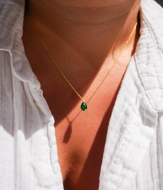 Elevate your elegance with our Emerald Pendant Necklace, featuring a genuine green emerald, perfect for those born in May. This exquisite necklace showcases a tiny teardrop-shaped emerald pendant, set delicately on a dainty chain. Chain Length: 16+2". Key Features: Genuine Green Emerald: Authentic, vibrant green emeralds for a stunning appearance. Teardrop Pendant: A petite pear-shaped emerald adds a touch of grace. May Birthstone: Celebrate your birth month or give a meaningful gift. Dainty Des Green Birthstone Teardrop Pendant Necklace, Green Teardrop Pendant Necklace With Birthstone, Elegant Green Drop Necklace As A Gift, Green Teardrop Pendant Birthstone Necklace, Elegant Green Drop Necklace For Gifting, Elegant Green Drop Necklace For A Gift, Pear-shaped Gemstone Necklace For May Birthstone, Green Teardrop Pendant Necklace For May Birthstone, Green Drop-shape Birthstone Necklace