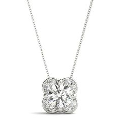 a white diamond flower necklace on a chain with diamonds in the center and an open back