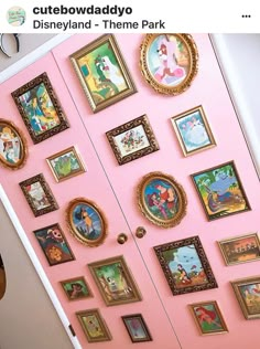 a pink door with many pictures on it