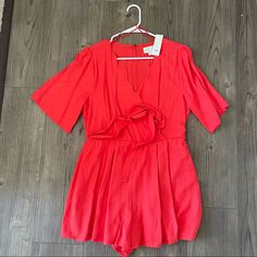 New With Tags Red Romper With Scalloped Detail, Tie For Waist Red Jumpsuits And Rompers For Summer Workwear, Casual Red V-neck Jumpsuits And Rompers, Casual Red V-neck Jumpsuit, Red V-neck Jumpsuits And Rompers For Spring, Red V-neck Jumpsuit For Spring, Chic Red Short Sleeve Jumpsuits And Rompers, Red Jumpsuits And Rompers For Day Out, Red Fitted Jumpsuits For Day Out, Light Blue Romper