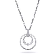 The Cloud Double Ring Pendant Necklace displays the shared prong motif ring and larger solid gold ring. It's the perfect gift for someone special. SKU #P385 15mm x 1mm ring and 9mm x 2mm diamond ring pendant 1.5mm cable chain adjustable from 18”-20” 0.21ctw 14K yellow or white gold Modern Round Diamond Jewelry, Modern Brilliant Cut Jewelry For Anniversary, Minimalist Jewelry With Tension Setting For Anniversary, Modern Jewelry With Round Band For Anniversary, Minimalist Anniversary Jewelry With Tension Setting, Fine Jewelry Platinum With Tension Setting, Modern Round Band Jewelry For Anniversary, Modern White Gold Jewelry With Tension Setting, Modern Round Cut Jewelry For Anniversary