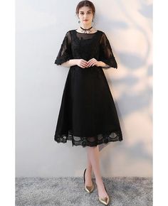 Shop Black Knee Length Homecoming Party Dress with Sheer Sleeves online. All instock with free shipping. Pro since 2009. Knee-length Lace Dress For Prom Season, Party Lace Midi Dress With Stretch, Party Lace Stretch Midi Dress, Fitted Black Lace Dress For Banquet, Black Lace Dress For Party Season, Formal Stretch Lace Dress, Elegant Black Lace Dress For Banquet, Black Stretch Evening Dress For Wedding, Black Stretch Dress For Banquet